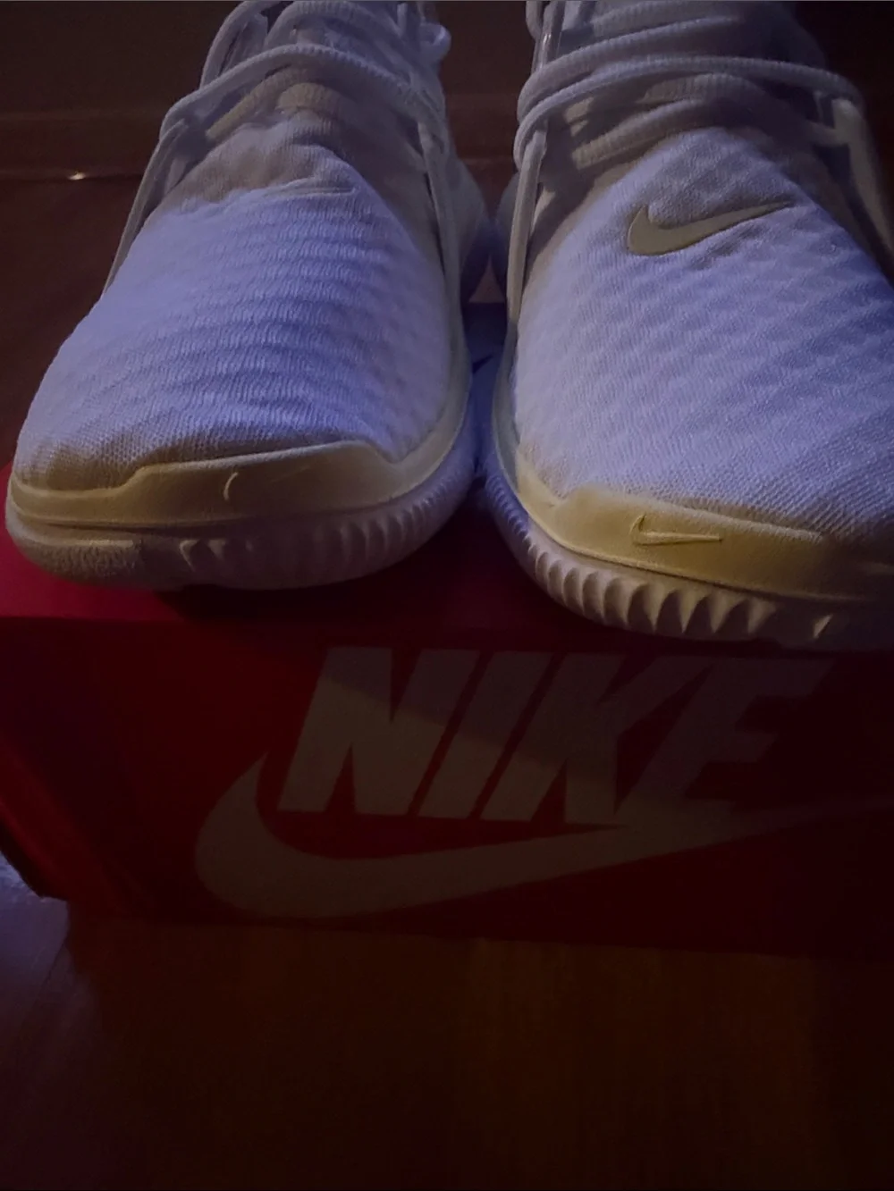 Nike White Athletic Sneakers with Blue Swoosh and Cream Trim